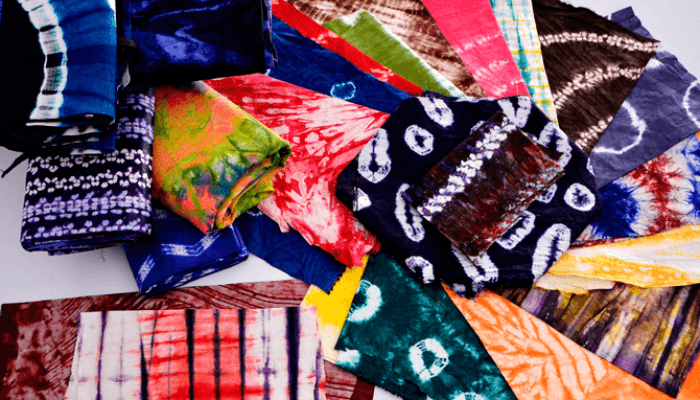 Detailed view of Adire Oniko fabric with geometric tie-dye motifs