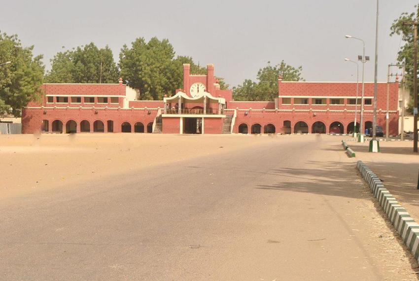 Exterior view of the Shehu of Borno Palace, showcasing traditional Kanuri architecture and intricate designs.