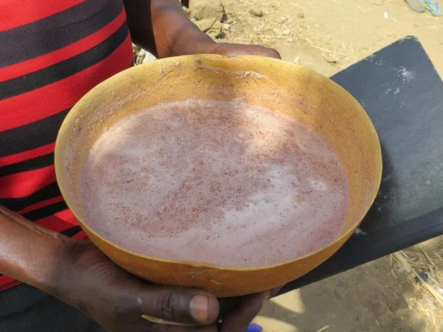 Burukutu, a rustic and flavorful Nigerian beer made from fermented sorghum or millet