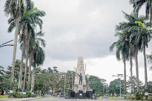  Lush greenery and peaceful walkways in Isaac Boro Park, perfect for relaxation and picnics.