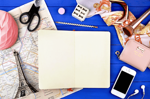  Writing in a travel notebook as part of documenting your Nigerian adventures.