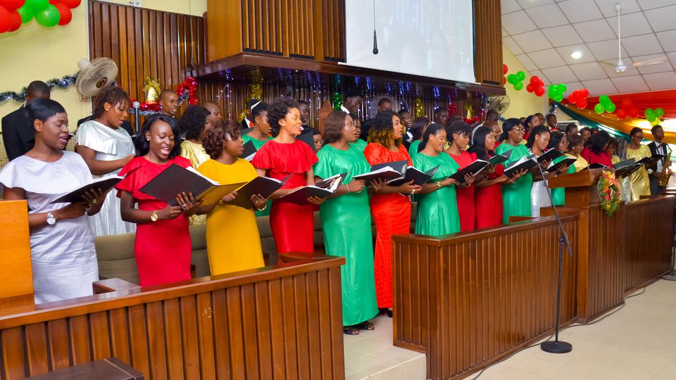 Choir members singing during a Christmas church service in Nigeria
