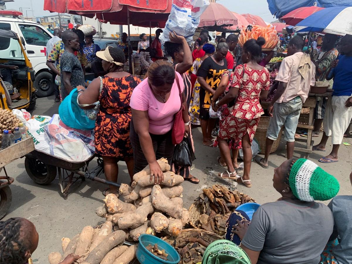  Lady shopping early for Christmas as a way to celebrate Christmas on a budget in Nigeria.