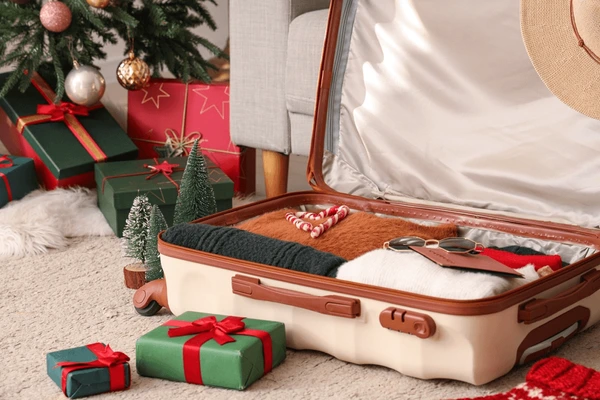 Travel bags packed in anticipation of the celebration of a Nigerian Christmas festival.
