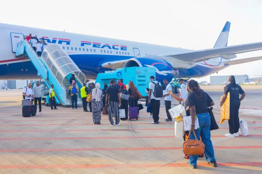  people boarding a plane at Chinua Achebe International Airport, one of the festive-friendly airports in the South-East. 