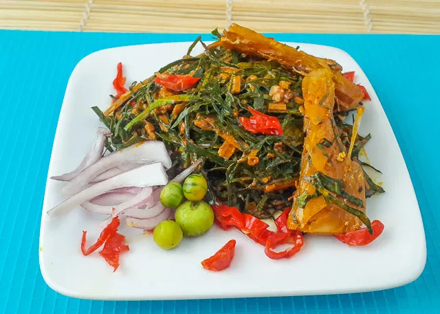  One of the indigenous foods of Abia State known as Okazi Agwolu agwo, served on a plate.
