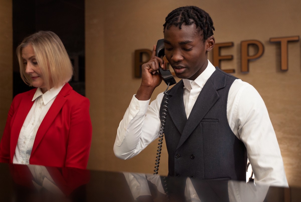 Customer service staff in Nigeria helping out non-English-speaking tourists.
