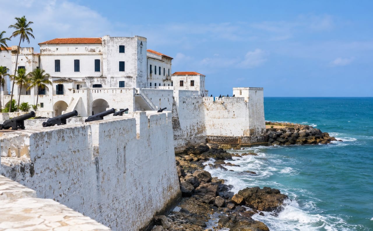 Whitewashed ramparts of Cape Coast Castle on Ghana's coast facing the Atlantic